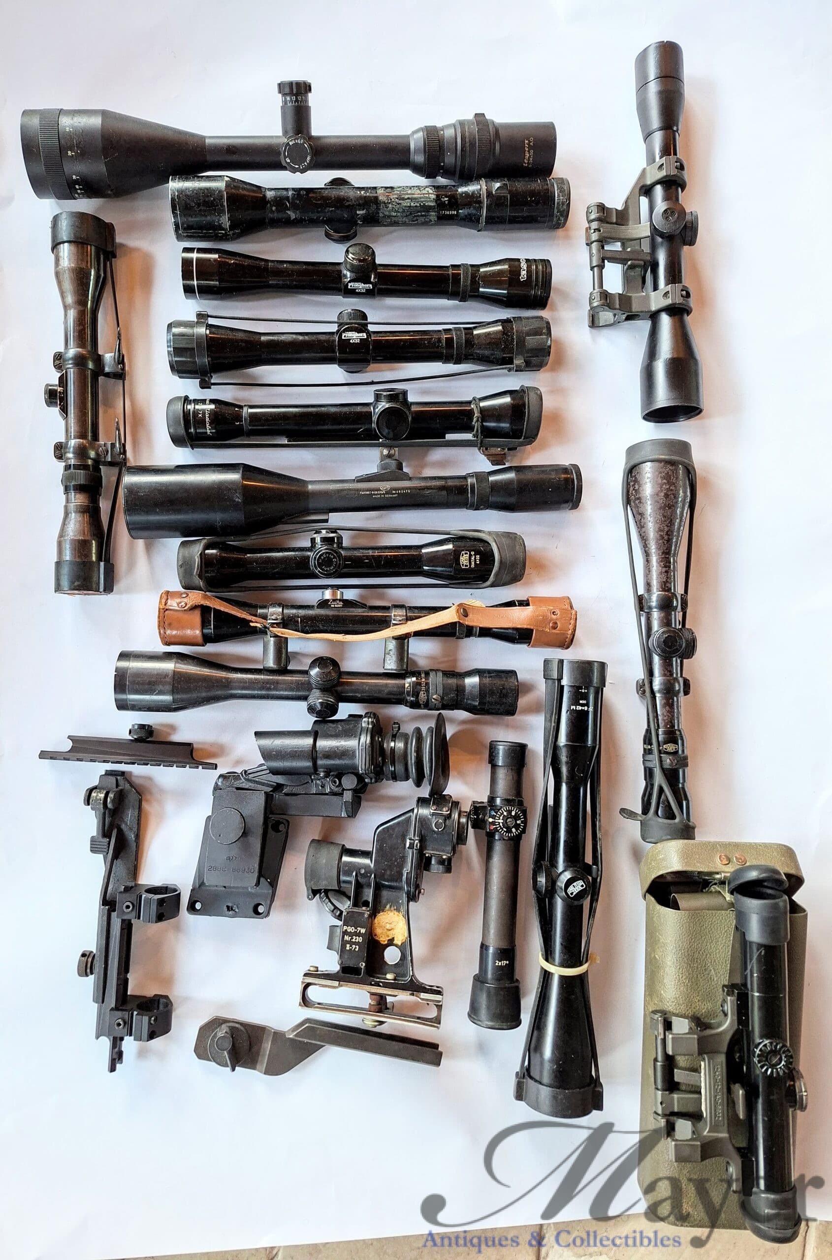 20260429_120130 Military surplus and civilian used rifle scopes and optics are for sale as one group.