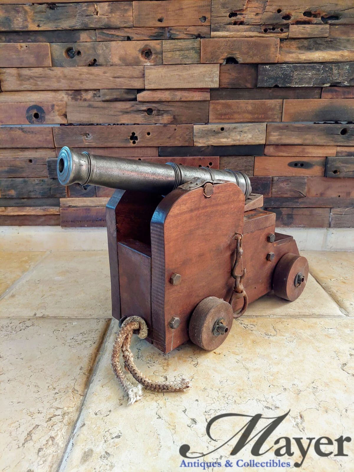 Vintage British Navy signal cannon with wooden carriage