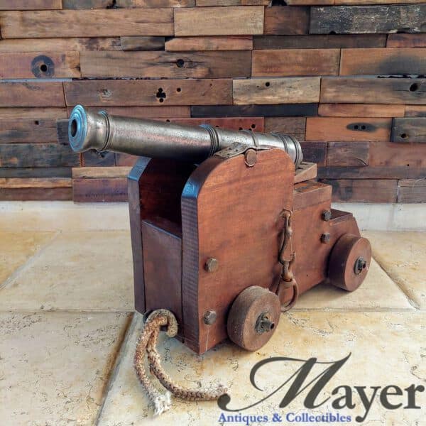 Vintage British Navy signal cannon with wooden carriage