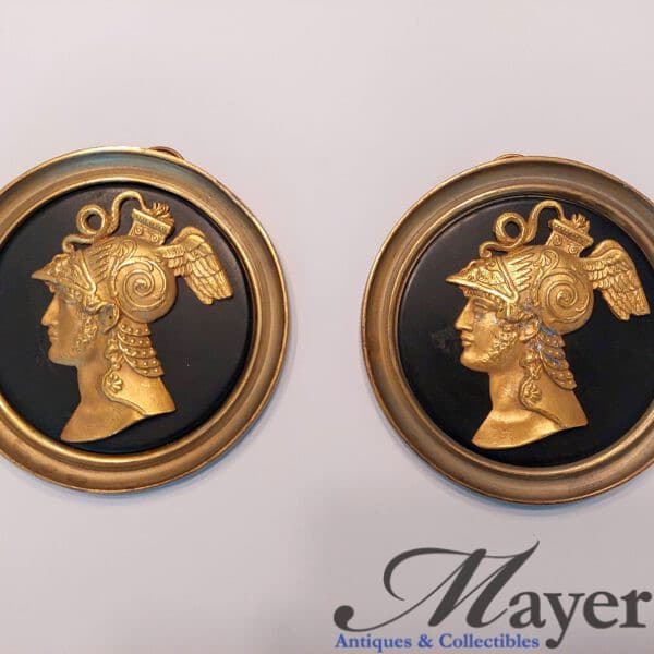A pair of French Napoleonic style medallions.
