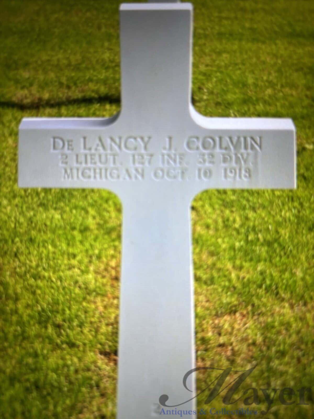 Grave headstone cross of Lieutenant De Lancy J. Colvin of Jackson, Michigan, a World War One hero killed in action in France in 1918.