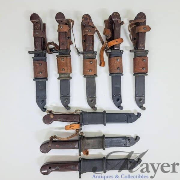 Israeli military surplus captured Romanian AKM bayonets, probably Type 1 model, most with leather frog.