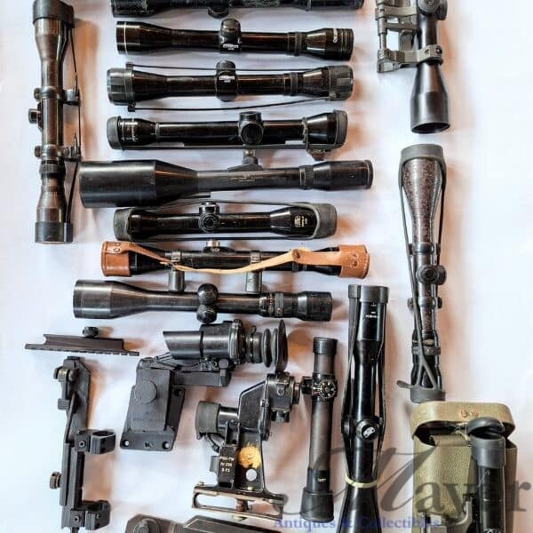 Military surplus and civilian used rifle scopes and optics are for sale as one group.